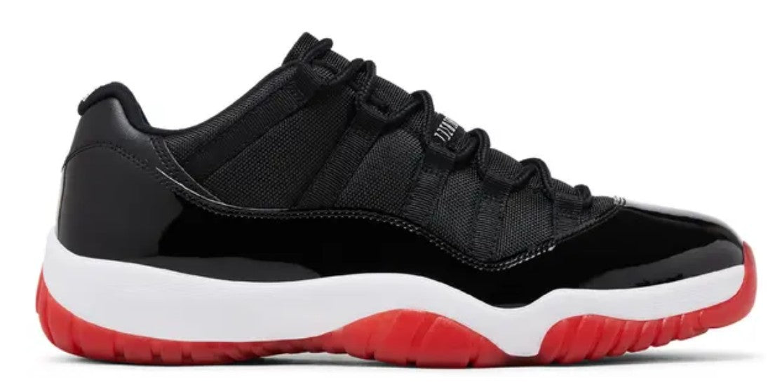 JORDAN 11 LOW TOP BRED